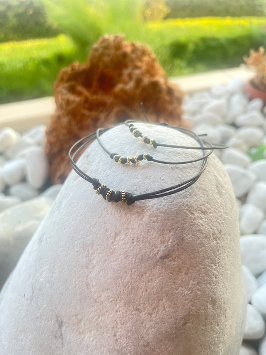 Leather and gold brass beads