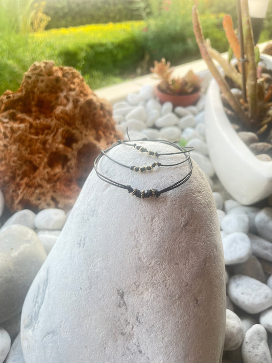 Leather and gold brass beads